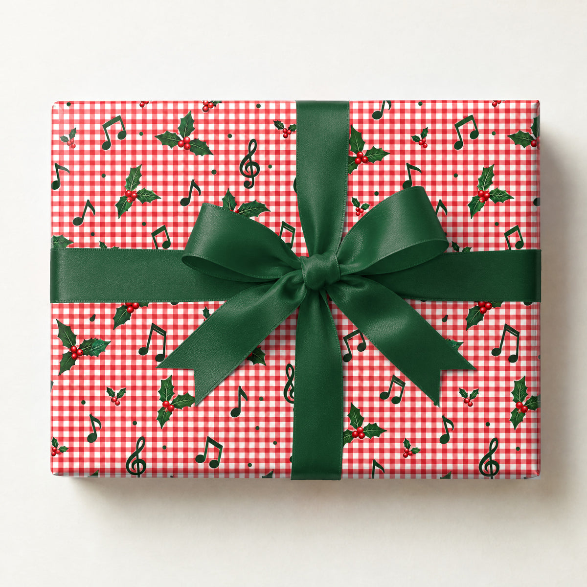 Red Gingham Music Note Wrapping Paper, a gift box wrapped in it and tied with a satin ribbon