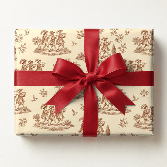 Pipers Piping Toile Wrapping Paper, a gift box wrapped in it and tied with a satin ribbon