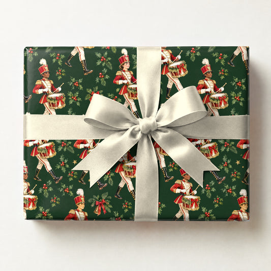 Tinsel Drumline March Wrapping Paper, a gift box wrapped in it and tied with a satin ribbon