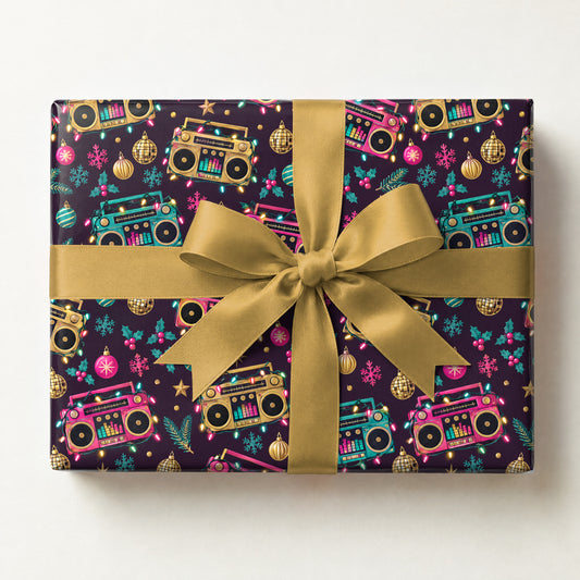 Holiday Boombox Glow Wrapping Paper, a gift box wrapped in it and tied with a satin ribbon