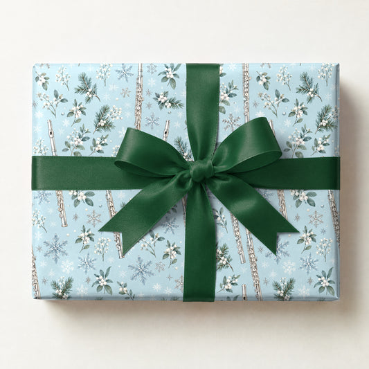 Flurries and Flutes Wrapping Paper, a gift box wrapped in it and tied with a satin ribbon