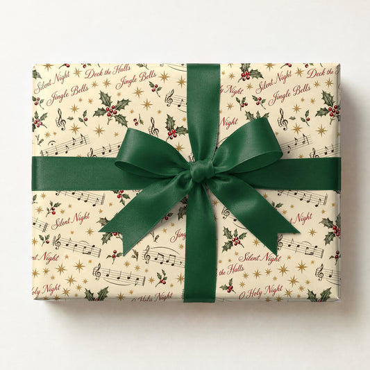 Christmas Carol Sheet Music Wrapping Paper, a gift box wrapped in it and tied with a satin ribbon