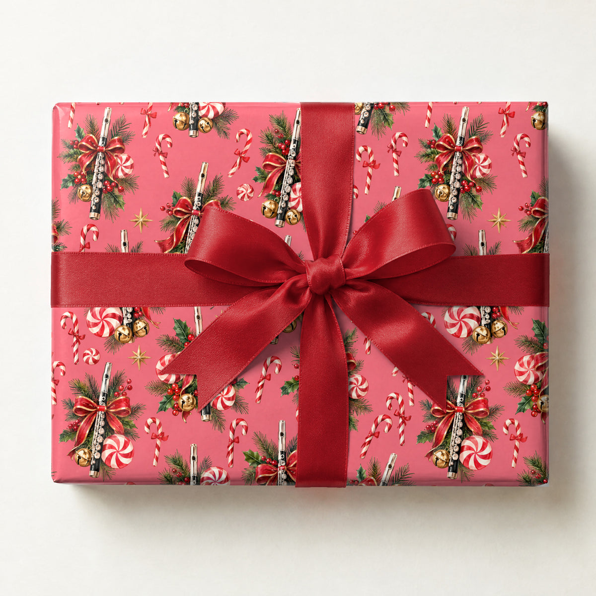 Peppermint Piccolo Swirl Wrapping Paper, a gift box wrapped in it and tied with a satin ribbon