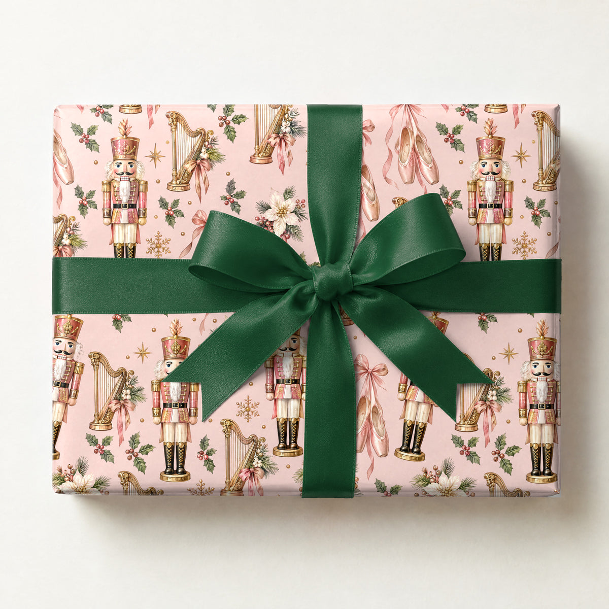 Nutcracker Ballet Blush Wrapping Paper, a gift box wrapped in it and tied with a satin ribbon