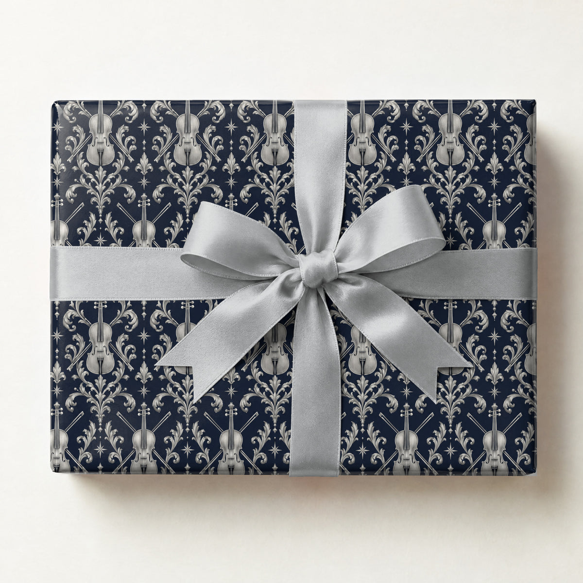Midnight Violin Filigree Wrapping Paper, a gift box wrapped in it and tied with a satin ribbon