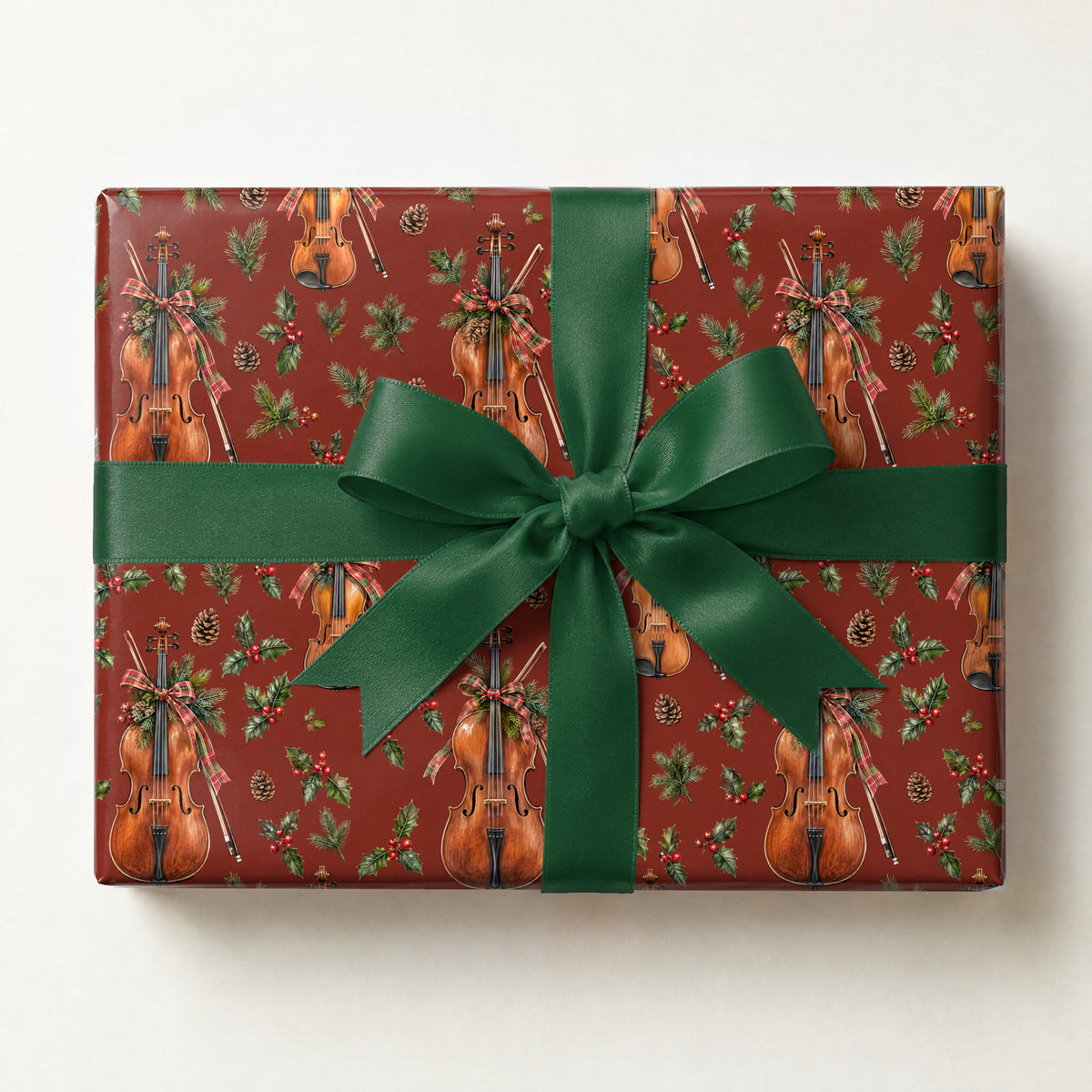 Fireside Fiddle Plaid Wrapping Paper, a gift box wrapped in it and tied with a satin ribbon