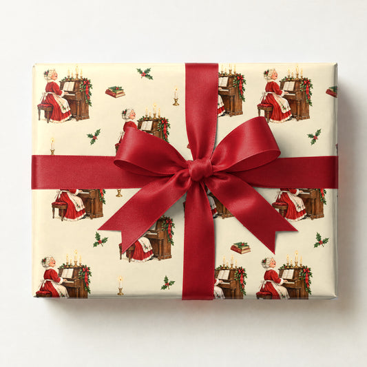 Mrs. Claus at the Piano Wrapping Paper, a gift box wrapped in it and tied with a satin ribbon