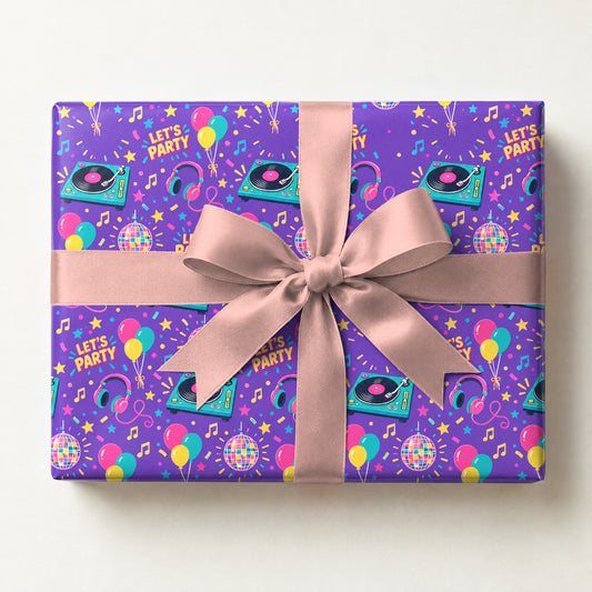 Birthday DJ Dance Party Wrapping Paper, a gift box wrapped in it and tied with a satin ribbon