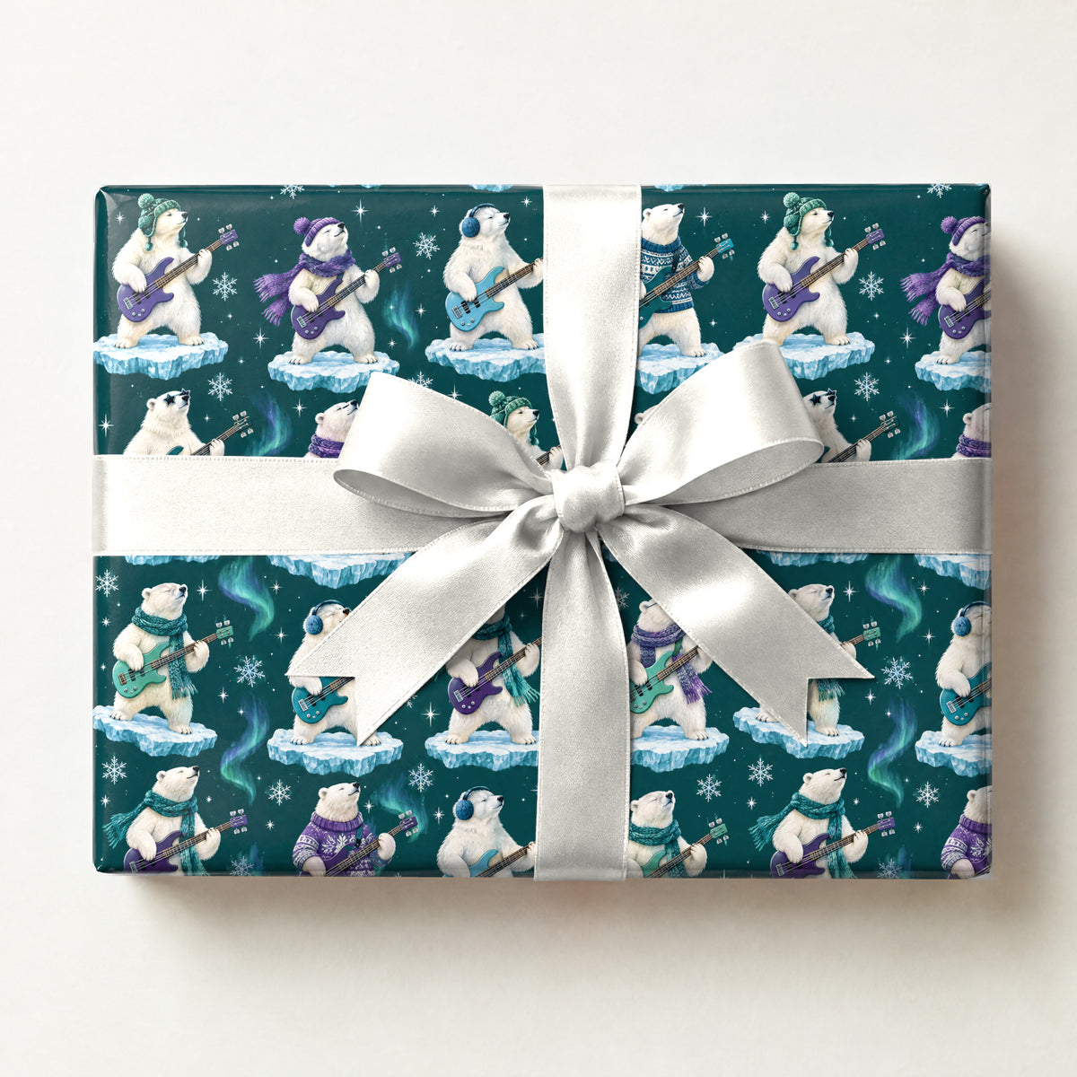 Polar Bear Bass Groove Wrapping Paper, a gift box wrapped in it and tied with a satin ribbon
