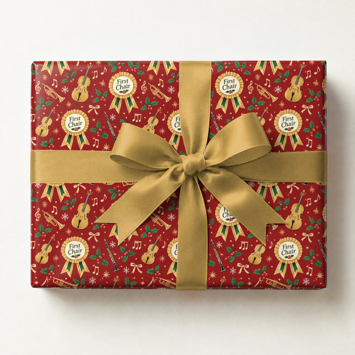 First Chair Christmas Wrapping Paper, a gift box wrapped in it and tied with a satin ribbon