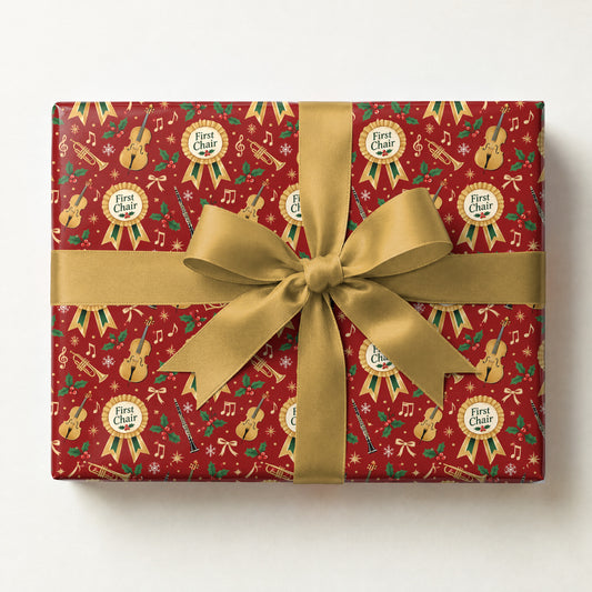 First Chair Christmas Wrapping Paper, a gift box wrapped in it and tied with a satin ribbon