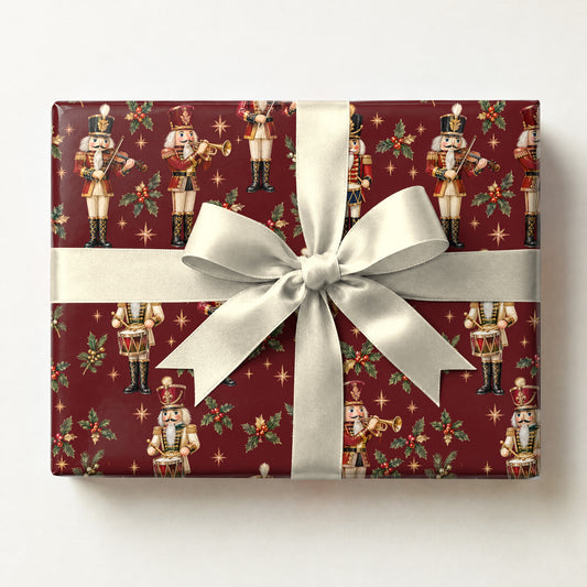 Nutcracker Orchestra Wrapping Paper, a gift box wrapped in it and tied with a satin ribbon