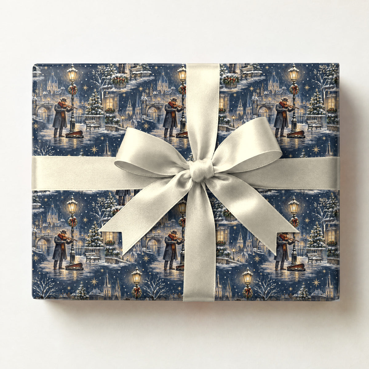 Snowy Street Musician Wrapping Paper, a gift box wrapped in it and tied with a satin ribbon