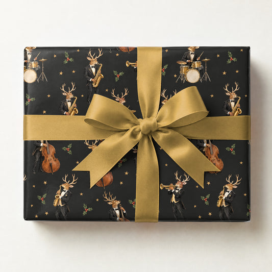 Reindeer Jazz Quartet Wrapping Paper, a gift box wrapped in it and tied with a satin ribbon