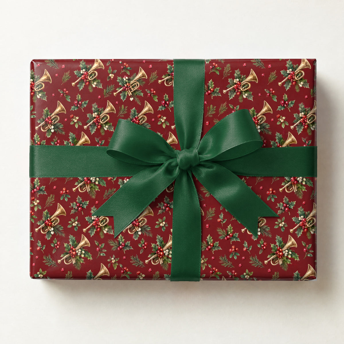 Cranberry Brass Sprig Wrapping Paper, a gift box wrapped in it and tied with a satin ribbon