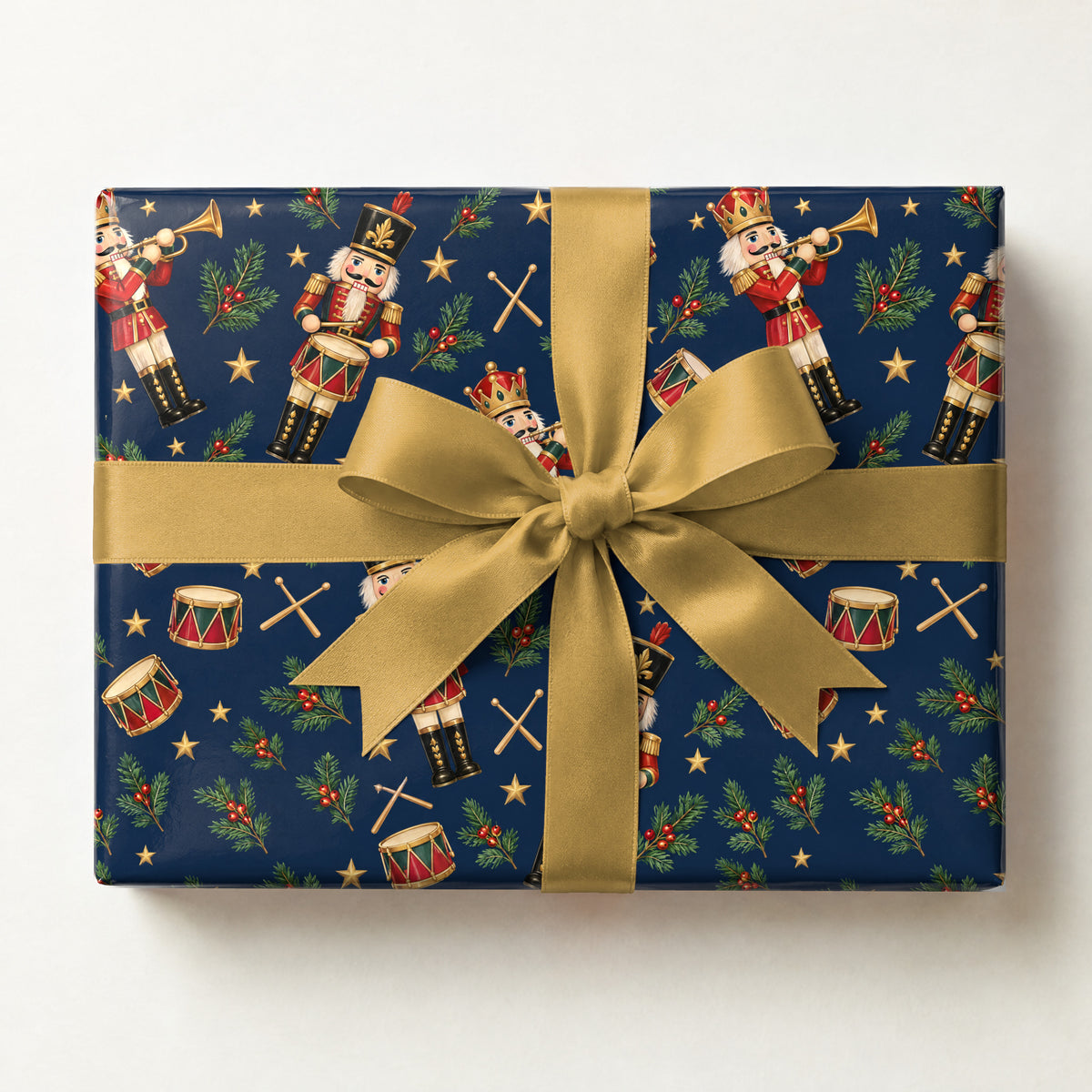 Nutcracker Drummers Wrapping Paper, a gift box wrapped in it and tied with a satin ribbon