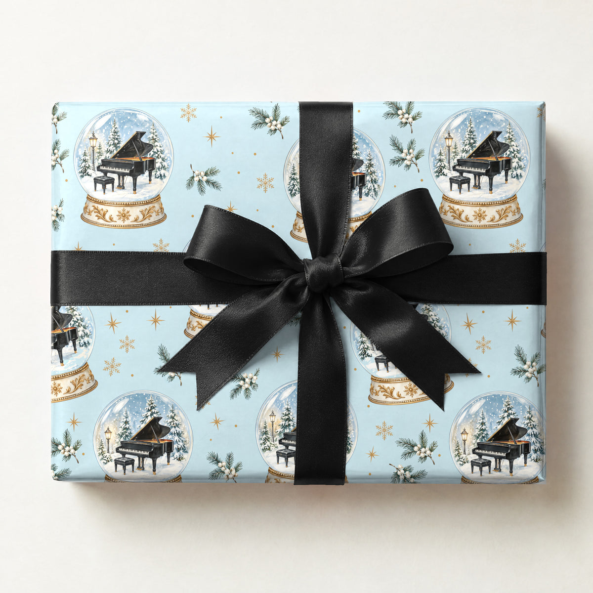 Grand Piano Snowglobe Wrapping Paper, a gift box wrapped in it and tied with a satin ribbon