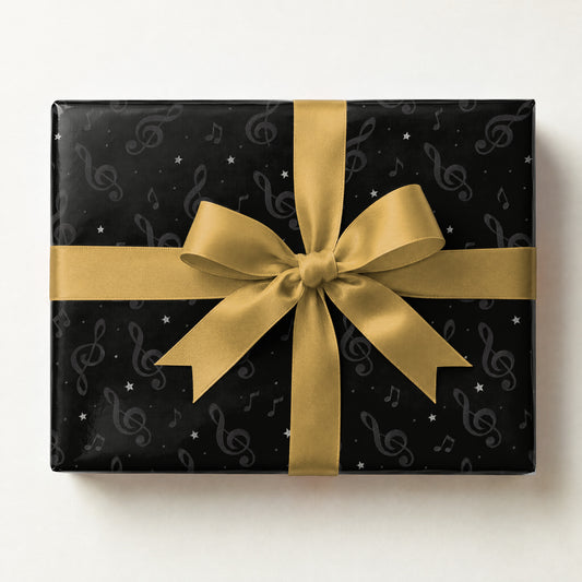 Noir Treble Hush Wrapping Paper, a gift box wrapped in it and tied with a satin ribbon