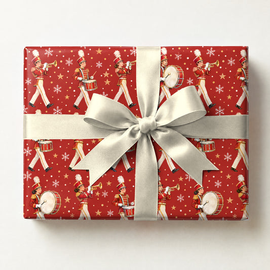 Holiday Marching Band Parade Wrapping Paper, a gift box wrapped in it and tied with a satin ribbon