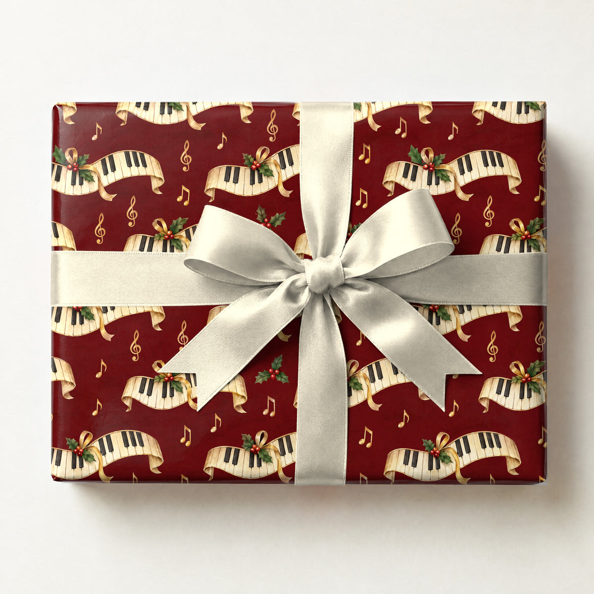 Velvet Red Piano Keys Wrapping Paper, a gift box wrapped in it and tied with a satin ribbon
