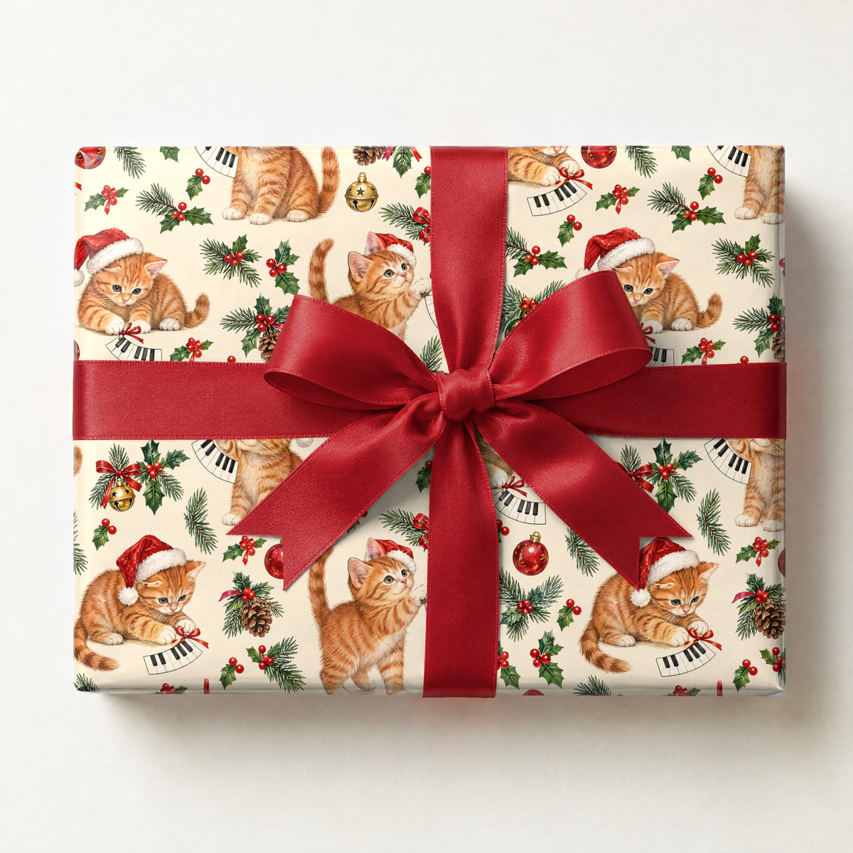 Tabby Cat Piano Christmas Wrapping Paper, a gift box wrapped in it and tied with a satin ribbon
