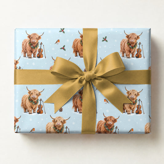 Highland Cow Fiddle Christmas Wrapping Paper, a gift box wrapped in it and tied with a satin ribbon