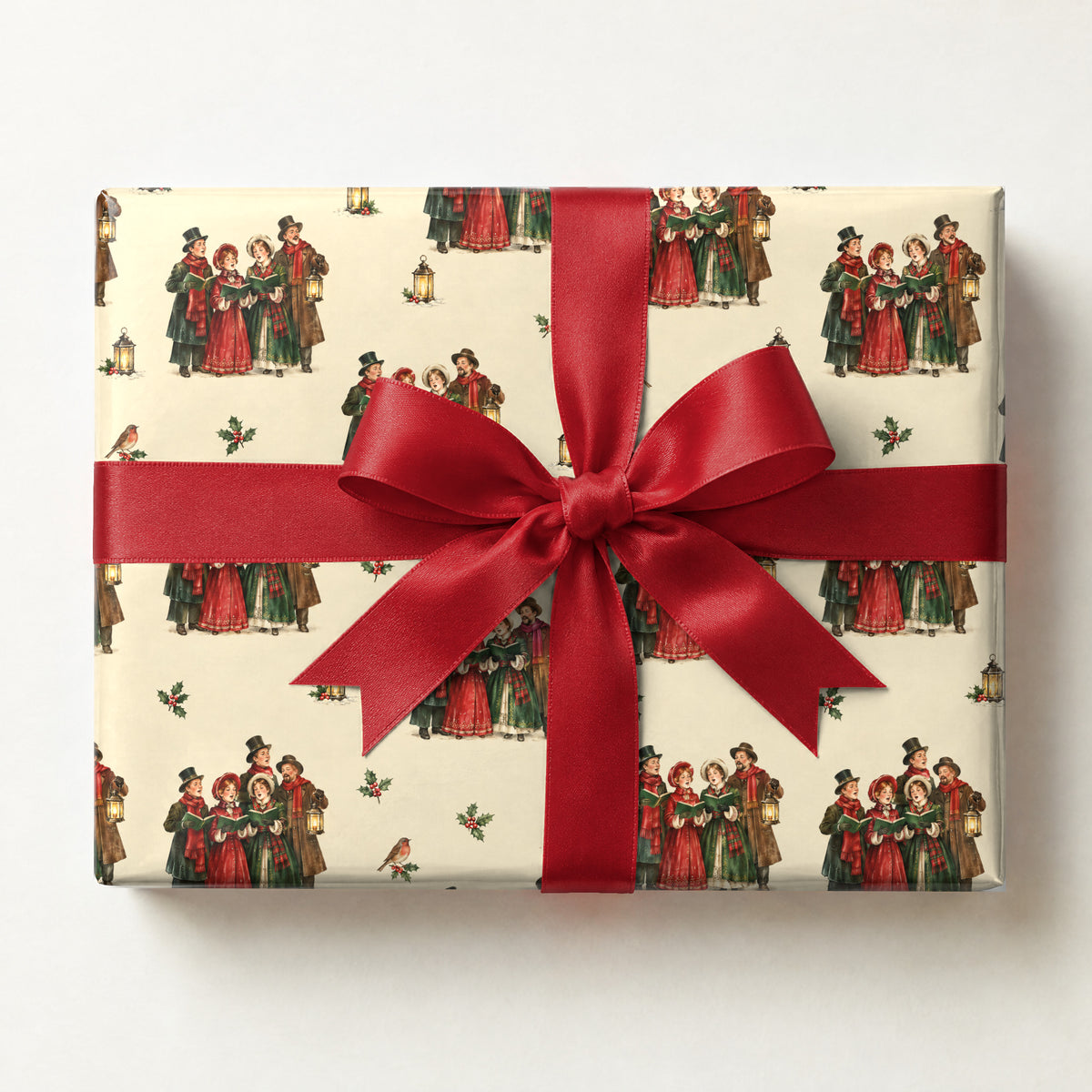 Caroling Quartet Wrapping Paper, a gift box wrapped in it and tied with a satin ribbon