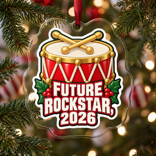 Future Rockstar 2026 Toy Drum clear acrylic Christmas ornament hanging on a Christmas tree with red and white baubles