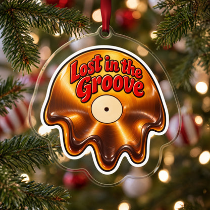 Lost in the Groove Melting Vinyl clear acrylic Christmas ornament hanging on a Christmas tree with red and white baubles