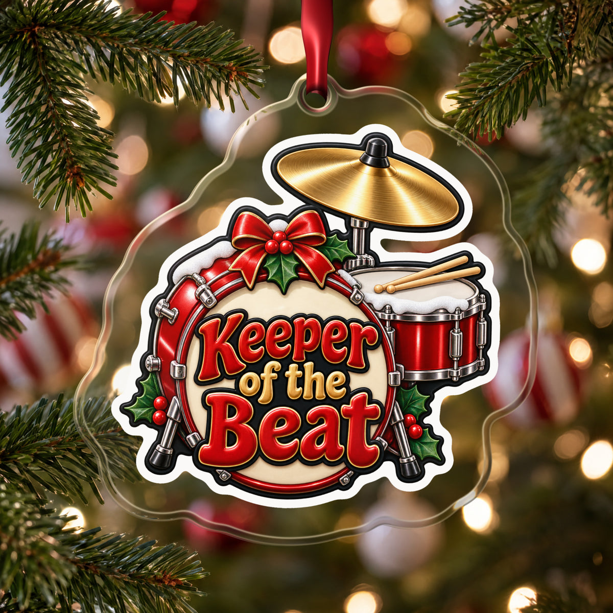 Keeper of the Beat Drum Kit clear acrylic Christmas ornament hanging on a Christmas tree with red and white baubles