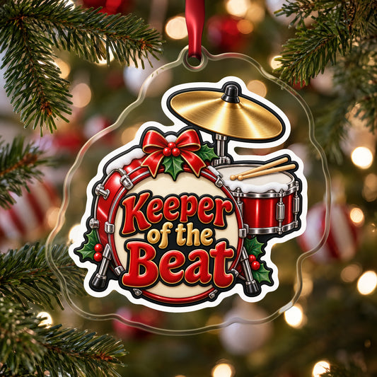Keeper of the Beat Drum Kit clear acrylic Christmas ornament hanging on a Christmas tree with red and white baubles