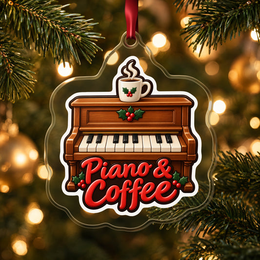 Piano & Coffee Christmas Ornament for Pianists clear acrylic Christmas ornament hanging on a lit Christmas tree with warm gold lights
