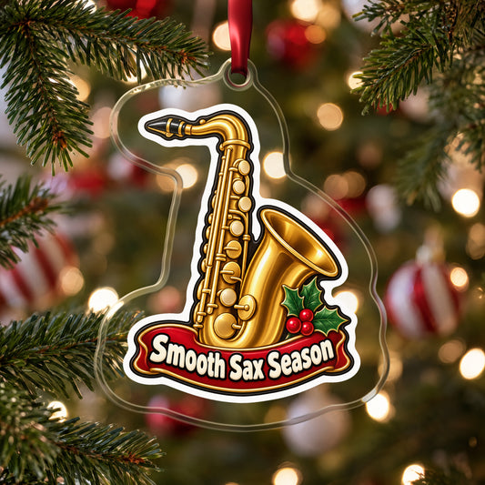 Smooth Sax Season Saxophone clear acrylic Christmas ornament hanging on a Christmas tree with red and white baubles