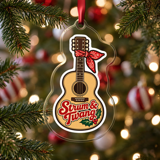 Strum & Twang Country Guitar clear acrylic Christmas ornament hanging on a Christmas tree with red and white baubles