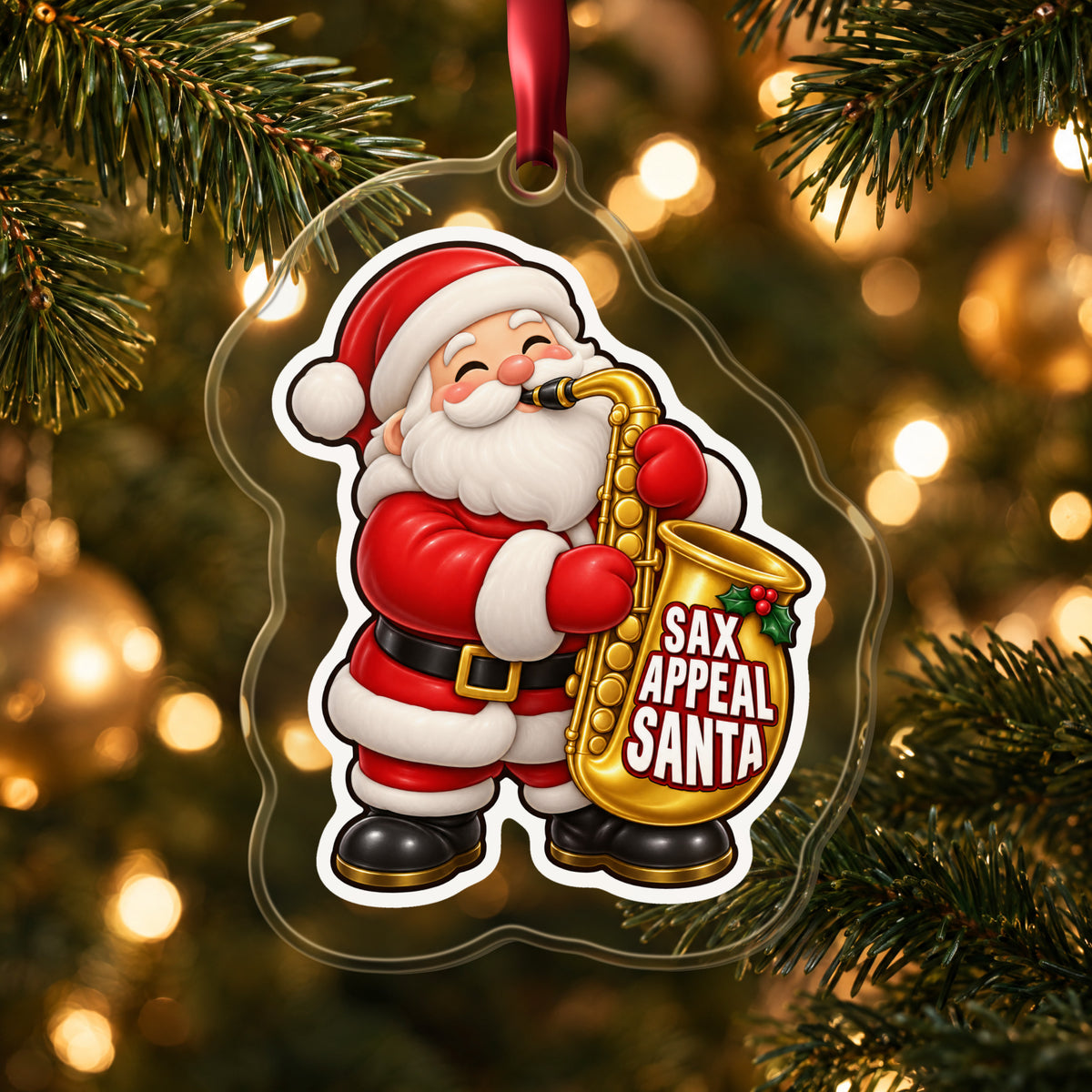 Sax Appeal Santa Saxophone clear acrylic Christmas ornament hanging on a lit Christmas tree with warm gold lights