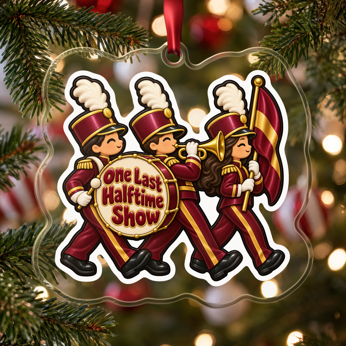 One Last Halftime Show Marching Band clear acrylic Christmas ornament hanging on a Christmas tree with red and white baubles