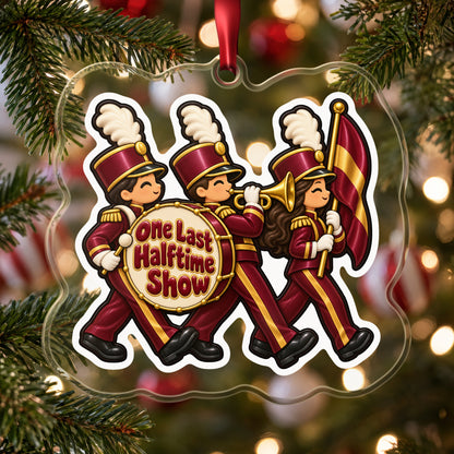 One Last Halftime Show Marching Band clear acrylic Christmas ornament hanging on a Christmas tree with red and white baubles