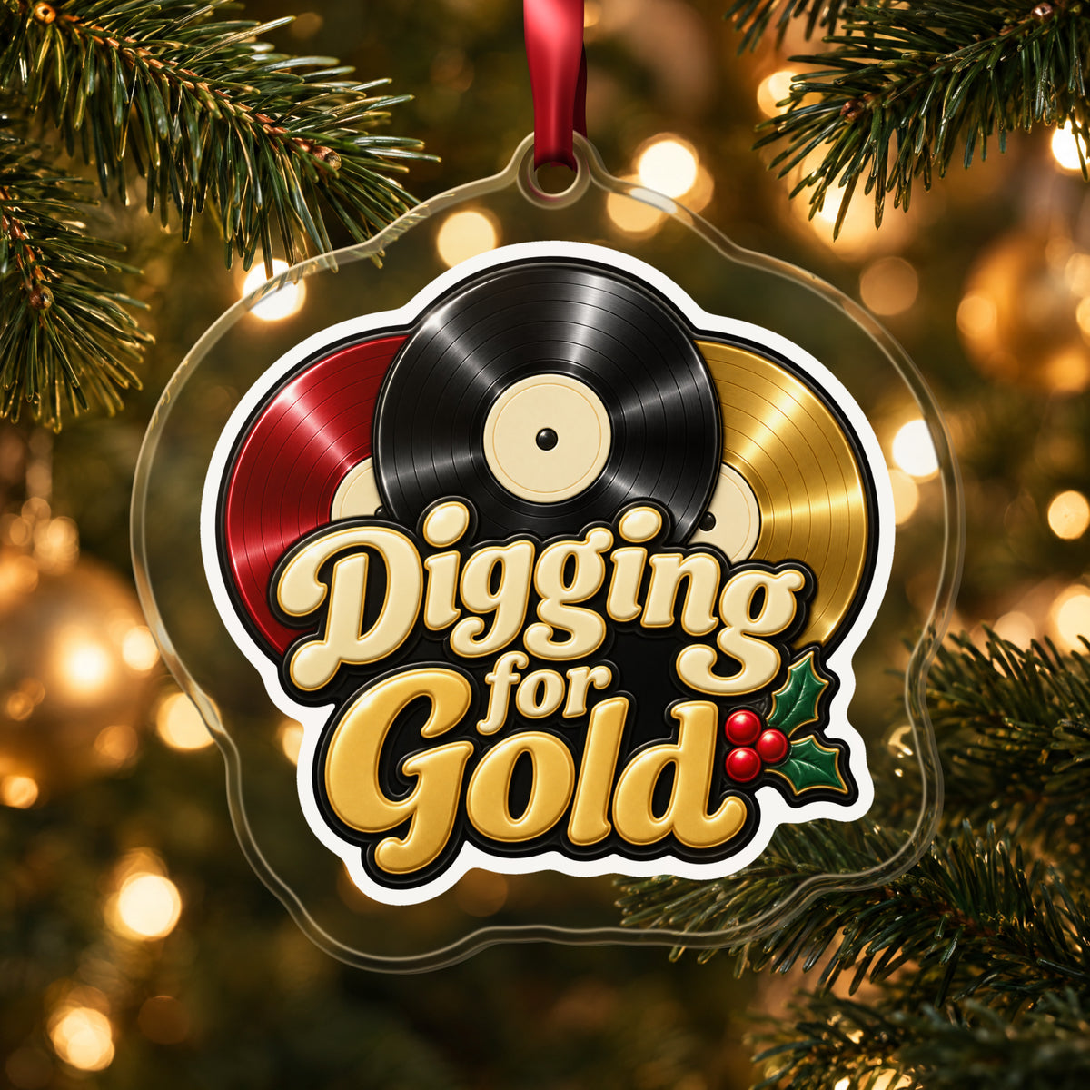 Digging for Gold Vinyl Records clear acrylic Christmas ornament hanging on a lit Christmas tree with warm gold lights