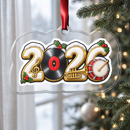 2026 Music Lover clear acrylic Christmas ornament hanging on a Christmas tree by a window in soft daylight