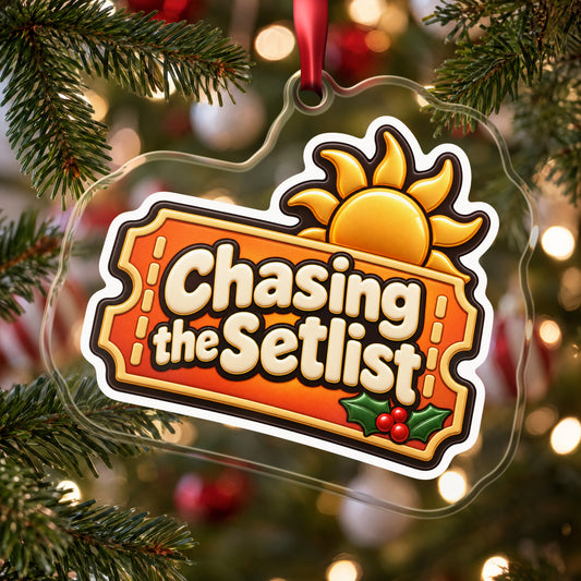 Chasing the Setlist Festival Ticket clear acrylic Christmas ornament hanging on a Christmas tree with red and white baubles
