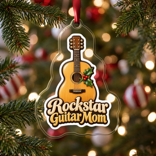 Rockstar Guitar Mom clear acrylic Christmas ornament hanging on a Christmas tree with red and white baubles
