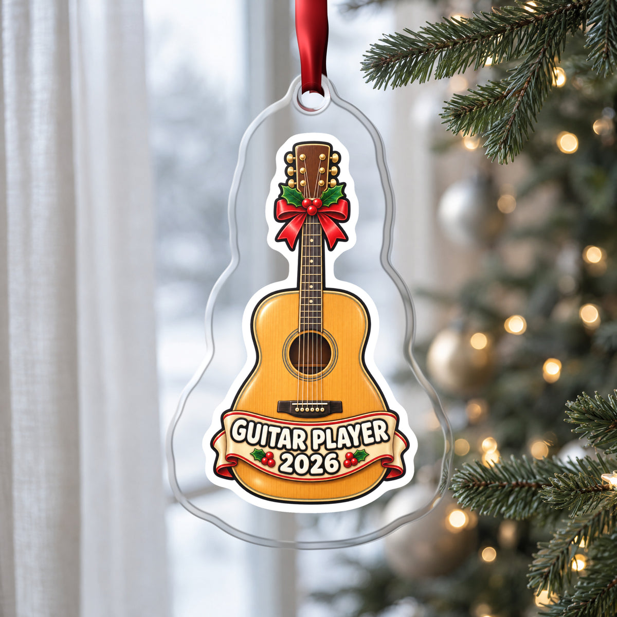 Guitar Player 2026 clear acrylic Christmas ornament hanging on a Christmas tree by a window in soft daylight