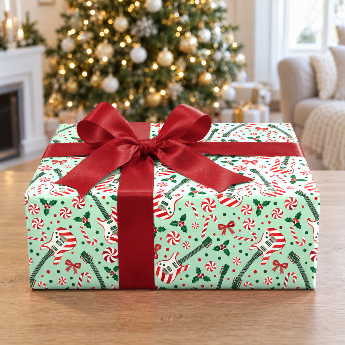 A gift wrapped in Candy Cane Guitars Wrapping Paper in front of a Christmas tree