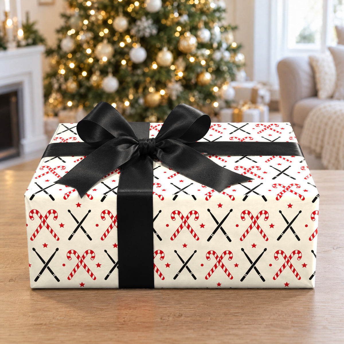 A gift wrapped in Drumstick Candy Cane Cross Wrapping Paper in front of a Christmas tree