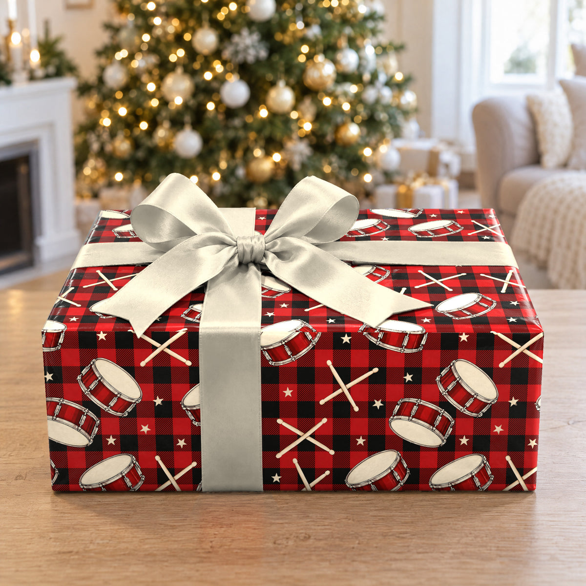 A gift wrapped in Buffalo Plaid Drumsticks Wrapping Paper in front of a Christmas tree