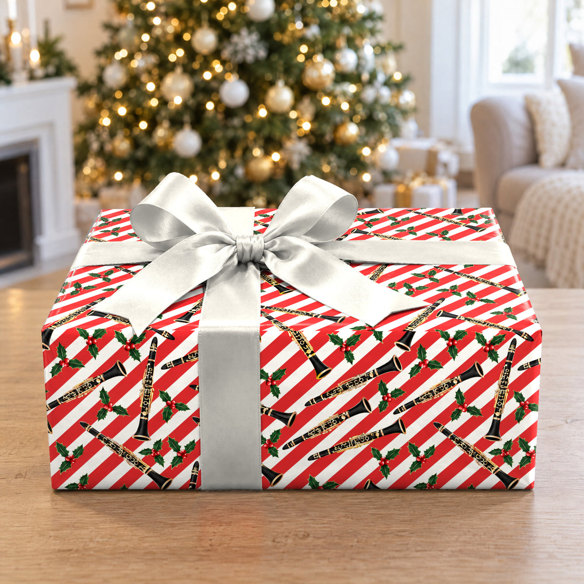 A gift wrapped in Cane and Clarinet Wrapping Paper in front of a Christmas tree