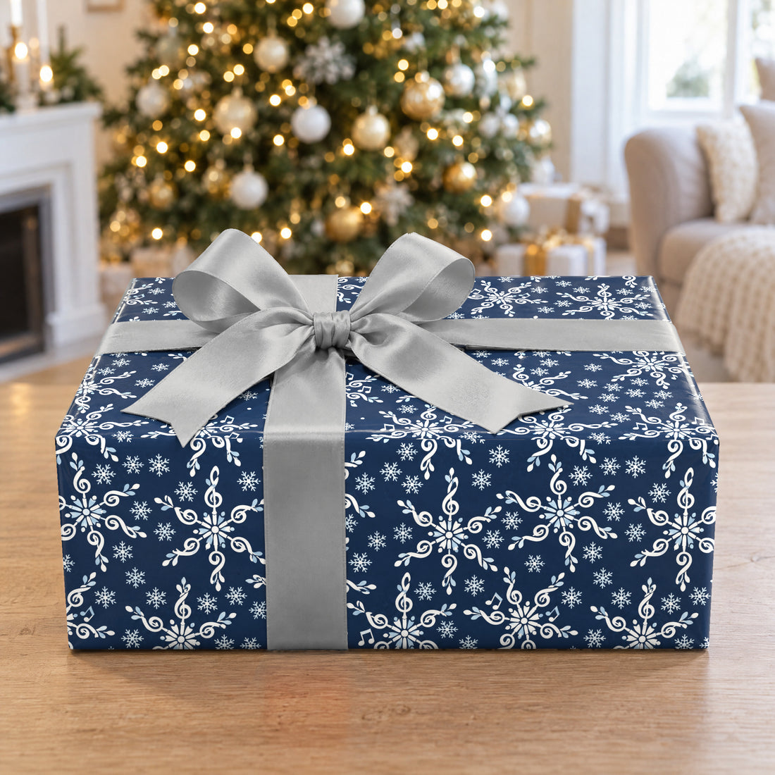 A gift wrapped in Treble Clef Snowflakes Wrapping Paper in front of a Christmas tree