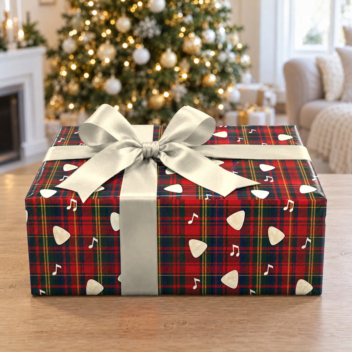 A gift wrapped in Rock and Roll Tartan Wrapping Paper in front of a Christmas tree
