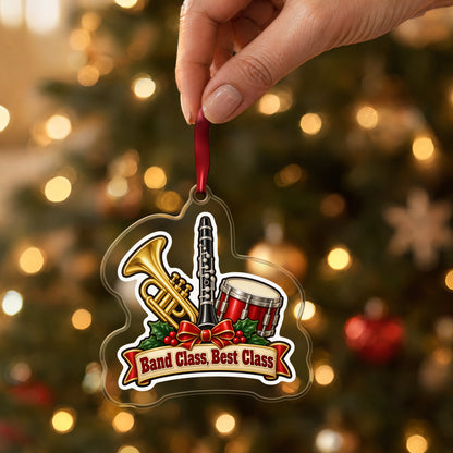 Band Class, Best Class School Band clear acrylic Christmas ornament held by its red ribbon in a hand, shown at its real size