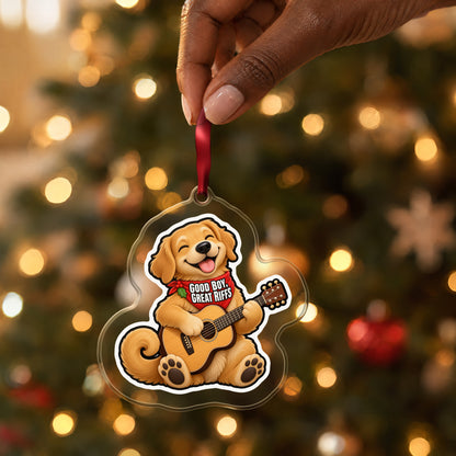 Good Boy, Great Riffs Dog Guitar clear acrylic Christmas ornament held by its red ribbon in a hand, shown at its real size